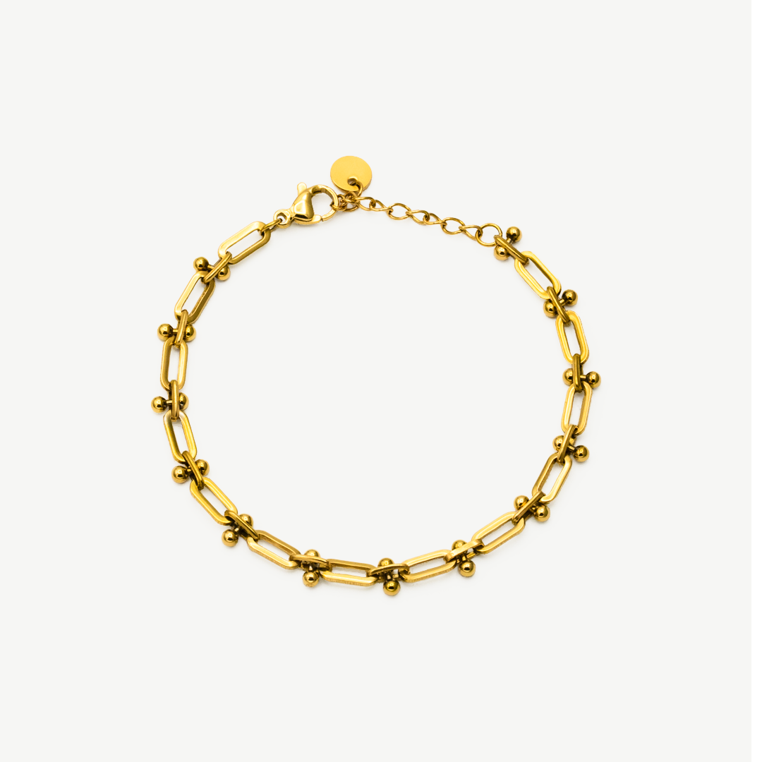 Pulsera Chain Gold con diseño de cadena dorada en baño de oro, elegante y moderna de Manía de Manía.